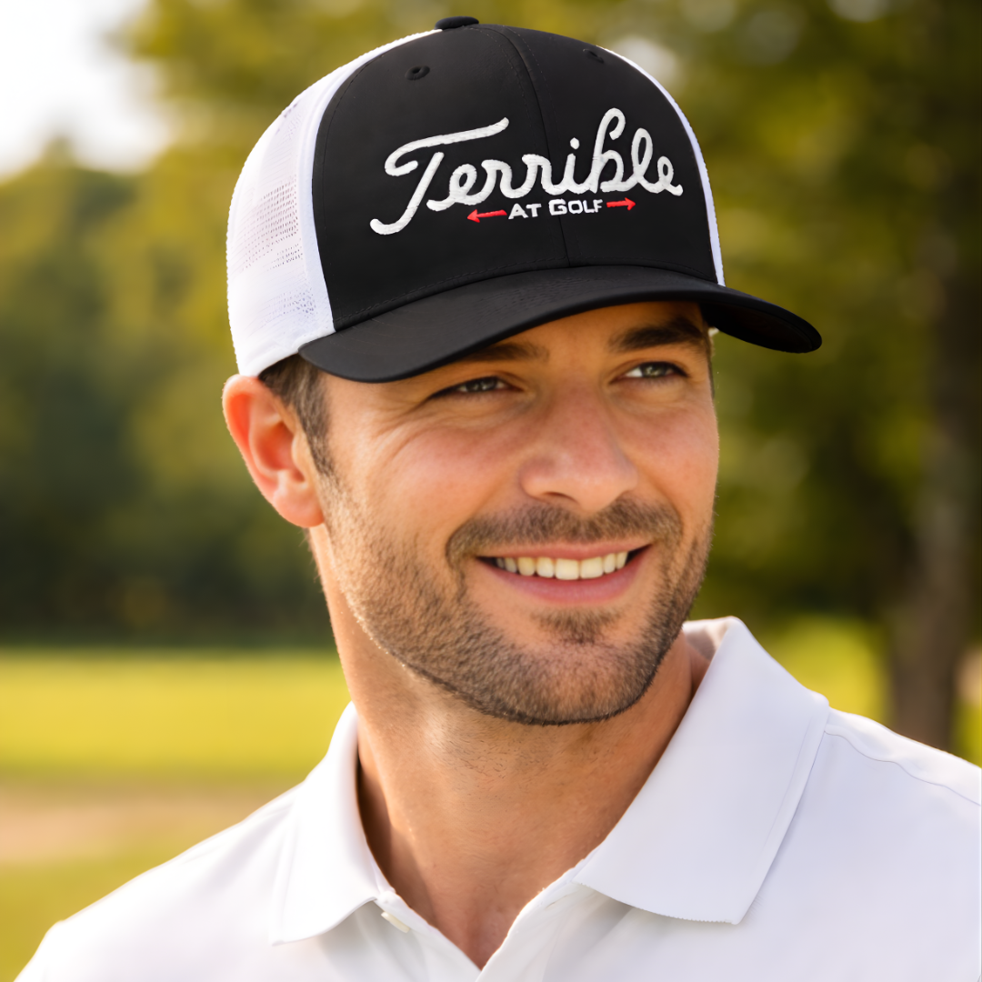 Terrible At Golf Closed-Back Trucker Cap by FlexFit®